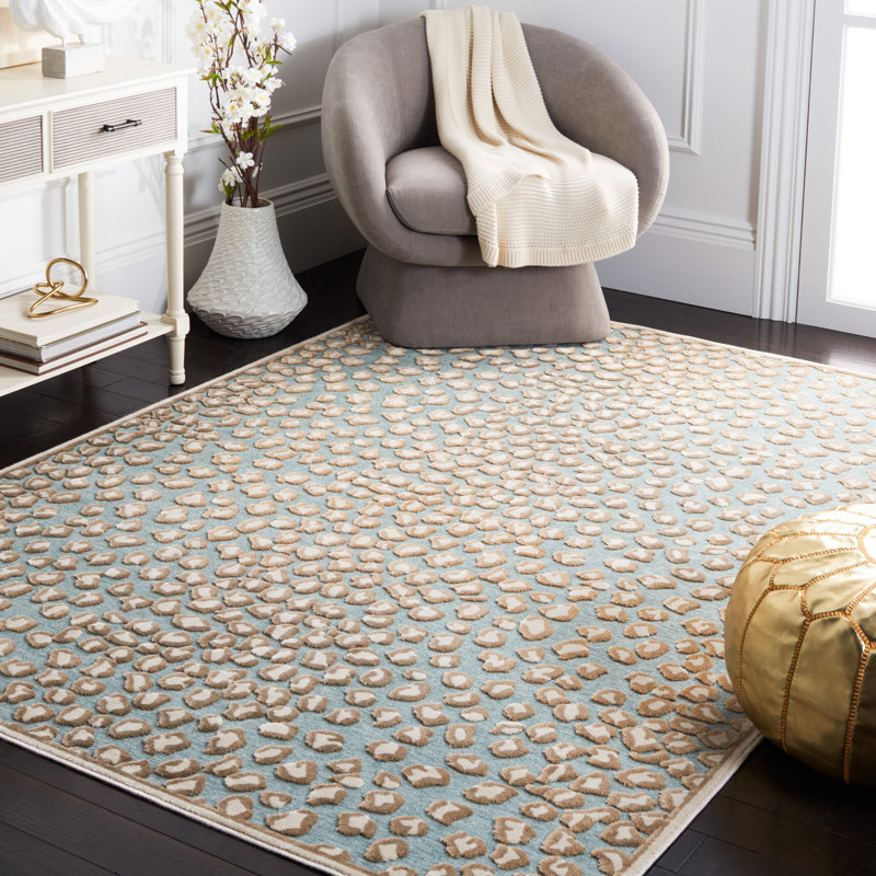 Banerjee Animal Print Area Rug in Stone/Aqua, Rectangle 5'3" x 7'6"
