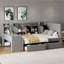 Lit de jour rembourré avec tiroirs, tablettes, armoires rabattables et table d'appoint
