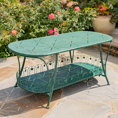 47.25"L. Embellished Oval Metal Garden Table with Shelf "Toulouse 1275" by Ophelia & Co.