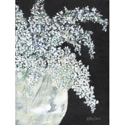 Lilas dans un vase rond