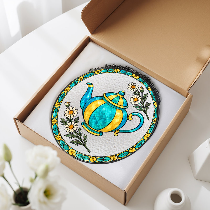Théière bleue et jaune avec des marguerites, H 7,8 po
