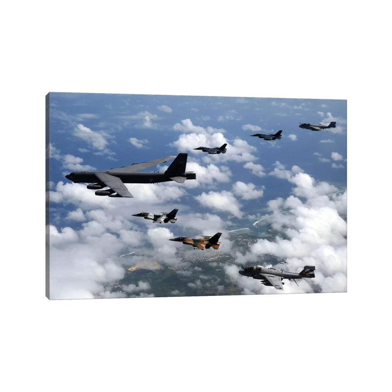 A B-52 Stratofortress Leads A Formation Of Aircraft Over Guam I by Stocktrek Images - Wrapped Canvas Print