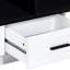 Table basse blanche et noire pour l'espace de vie: tiroir spacieux et tablette moderne: rangement avec 4 tablettes robustes
