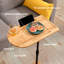 Table de canapé réglable en bambou avec un design ovale en forme de C.