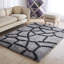 Tapis abstrait à poils longs gris / noir-53449212