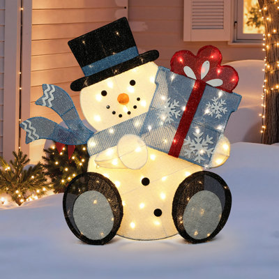 Décoration de Noël en tissu pré-illuminé de 80 cm représentant un bonhomme de neige tenant une boîte-cadeau