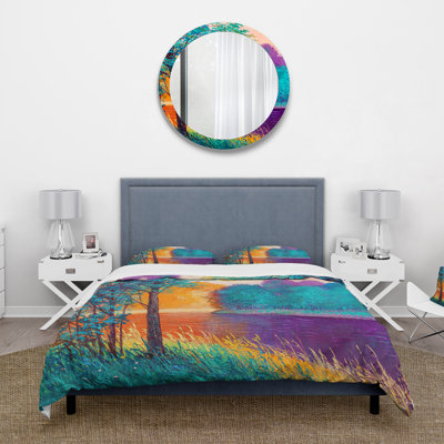 Ensemble de housse de couette en polyester coloré entre les arbres au crépuscule