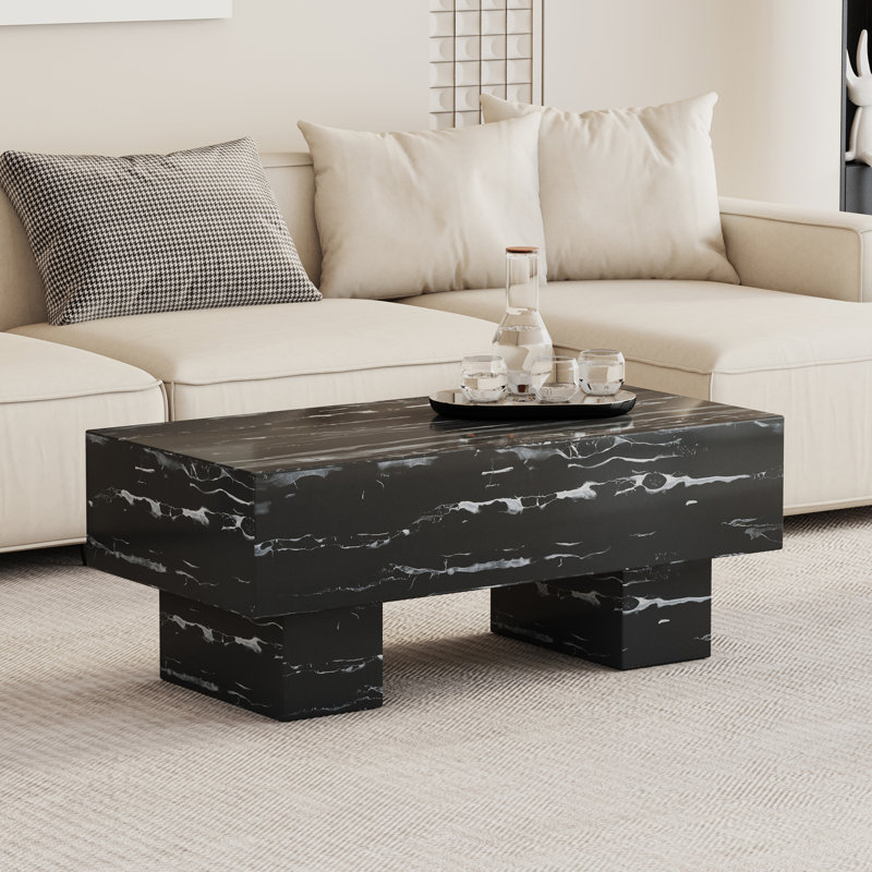 La table basse à texture de marbre noir de 43,3 po x 21,6 po 17,2 po ajoute de l'élégance à un salon moderne, pratique et attrayant