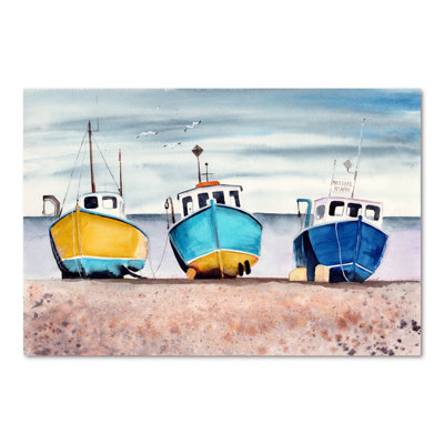 " Three Colourful Fishing Boats On A Sandy Seashore "