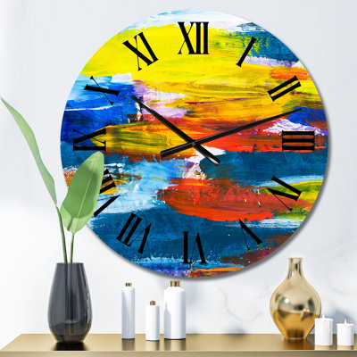 Horloge murale moderne jaune, rouge et bleu