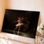 Toile «A Graceful Ballet Dancer Pose In A Dramatic Spotlightinging Wall Art», sa silhouette élégante sur fond de toile d'art riche-177665235