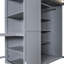 Lit mezzanine double gris avec bureau intégré et support de garde-robe élégant, trois tablettes pliables pour désencombrer la chambre à coucher, tablettes décoratives complémentaires à tout décor, espace de travail intégré pour la détente