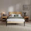 Structure de lit double Nesto avec tête de lit géométrique et pieds en métal noir mat, structure de lit plateforme en bois massif de première qualité, support à lattes de bois, aucun sommier nécessaire-338901806-338901795