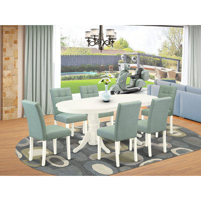 7 Piece Dining Set consists of a Mid-Century Dining Table and 6 Willow Green Faux Leather Modern Dining Chairs, Linen White