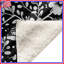 Couvertures florales noires et blanches-128732984