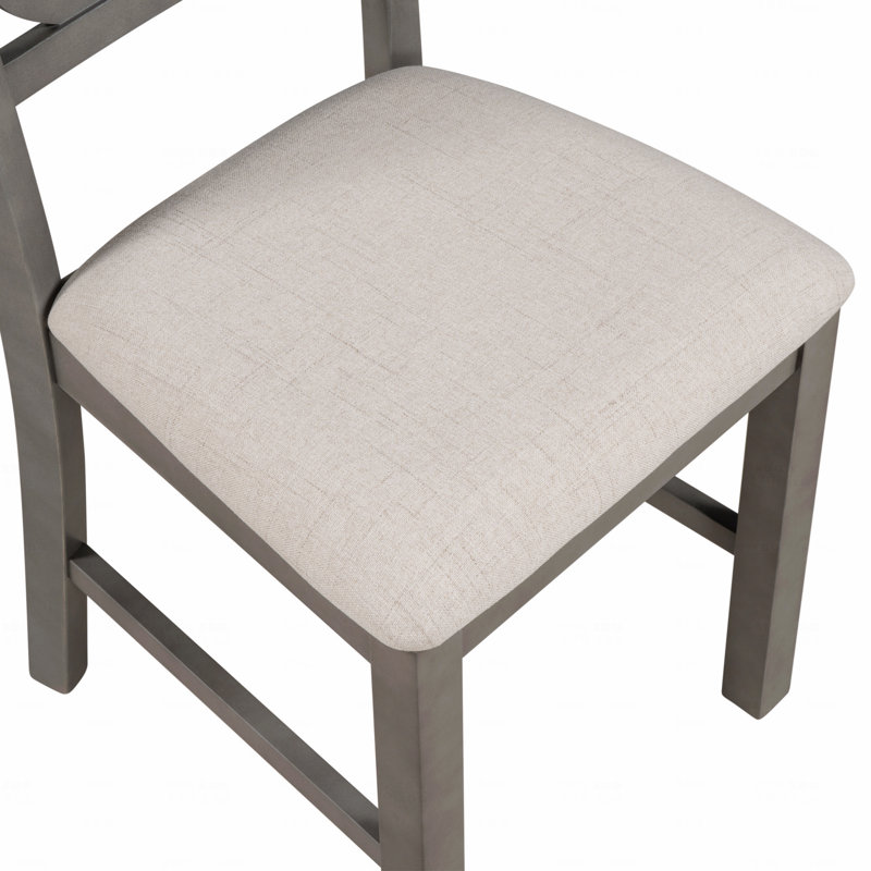 Ensemble 5 pièces de table de salle à manger et de chaises rondes avec des pieds de forme spéciale et un dossier creux de conception exquise