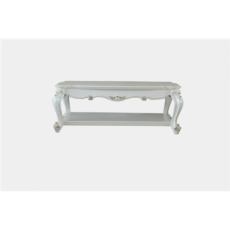 Table basse rétro avec base perlée