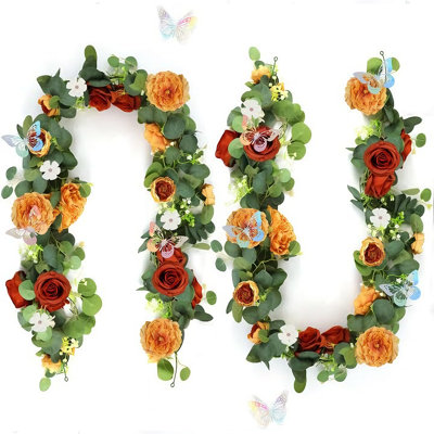 Guirlande artificielle de 2 eucalyptus et roses avec 24 papillons argentés découpés au laser – Vigne florale artificielle réaliste en soie et plastique – Arche de mariage, table de fête, décoration intérieure – Orange brûlé, 180 cm
