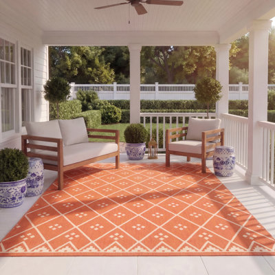 Tapis intérieur / extérieur rouille / gris clair Arneshia