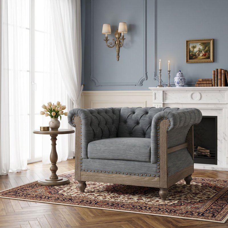 Fauteuil club capitonné