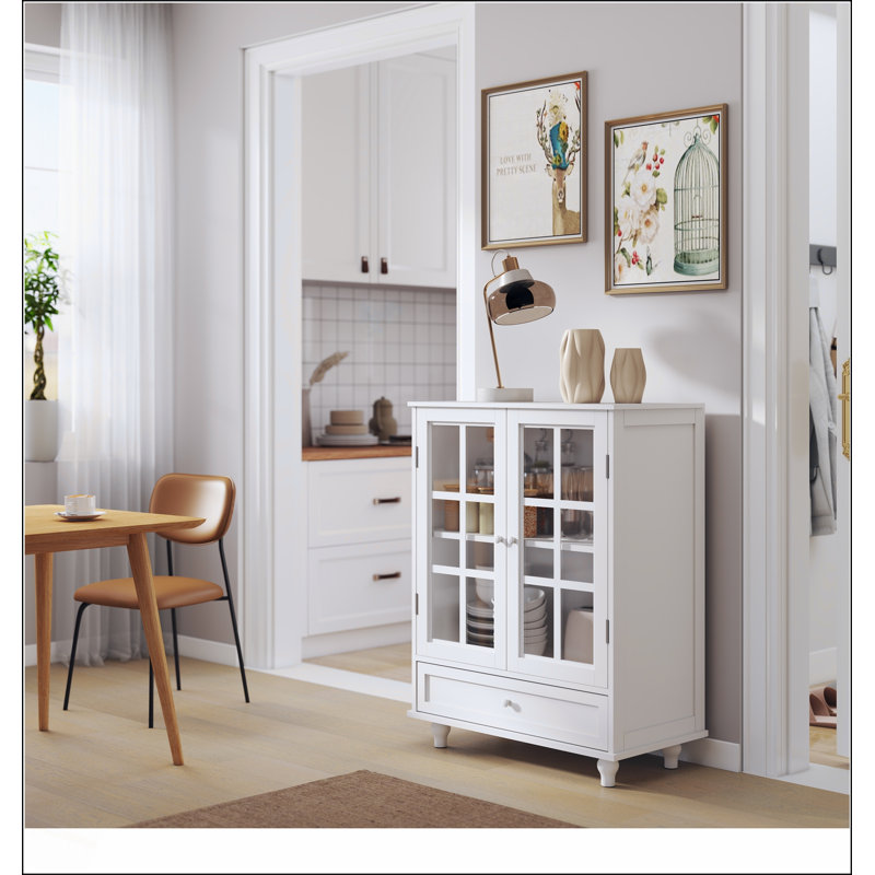 Buffet minimaliste blanc avec portes doubles en verre et tiroir