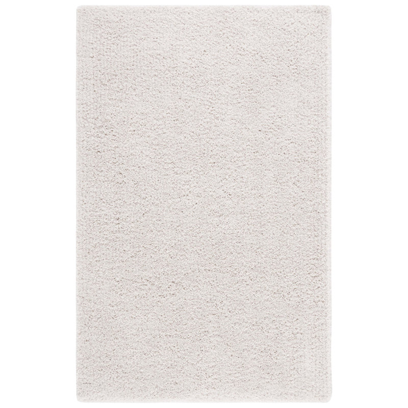 Assar Handmade Shag Ivory Rug, Rectangle 5' x 8'
