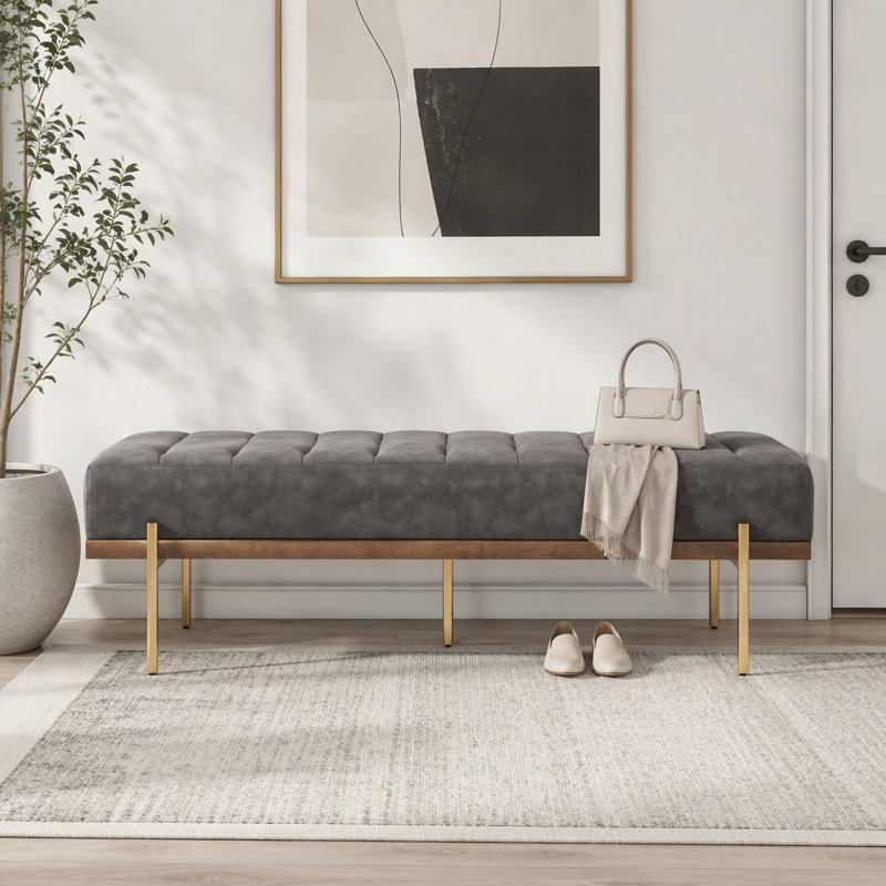 Banquette rembourrée capitonnée avec pieds dorés