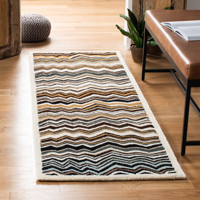 Tapis noir / brun / bleu en laine touffeté à la main à motif de chevrons Tanner
