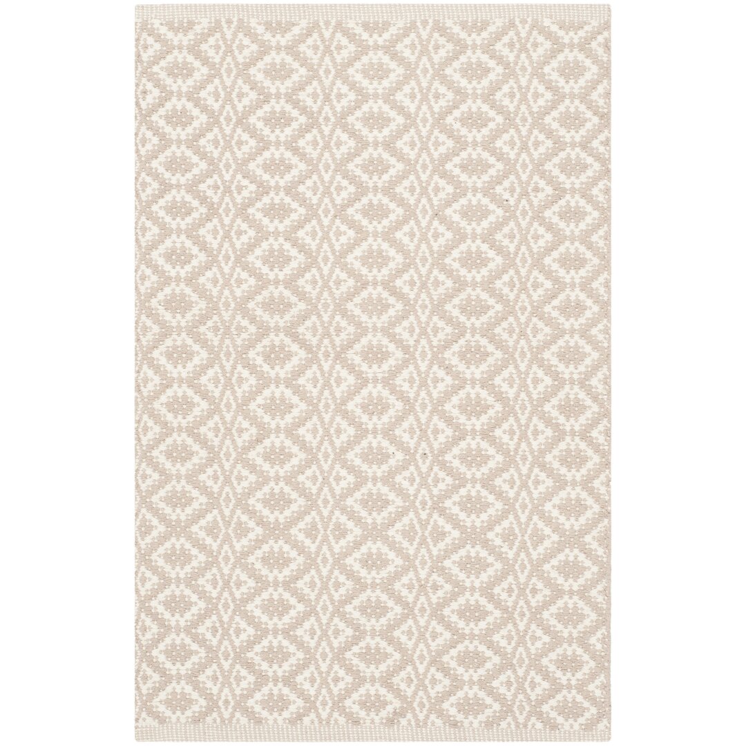 Handgefertigter Teppich Crispin aus Baumwolle in Elfenbein/Beige