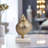 Figurine Metal and Marble Coastal Shell Design with Modern Spiraling Form on Solid Stone Base Inspired by Contemporary Nautical Trends in Mixed Materials Woods and Metals for Stylish Accent Decor-1163792284