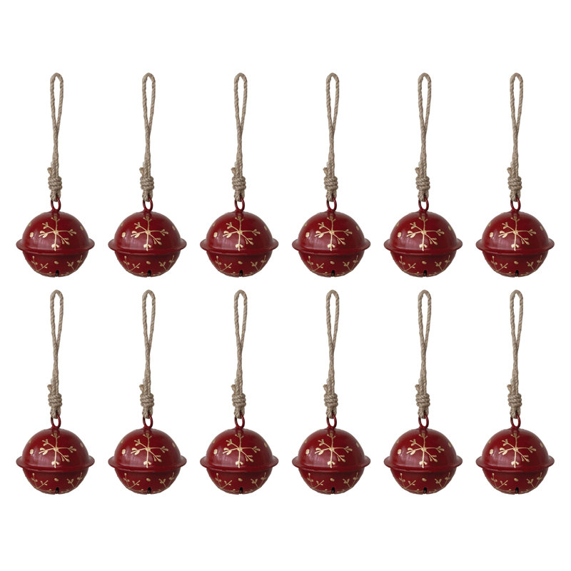 Ornement en forme de cloche en fer artisanal avec flocons de neige peints et boucle en jute