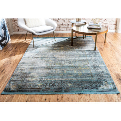 Tapis contemporain de couleur orangée Mulvihill