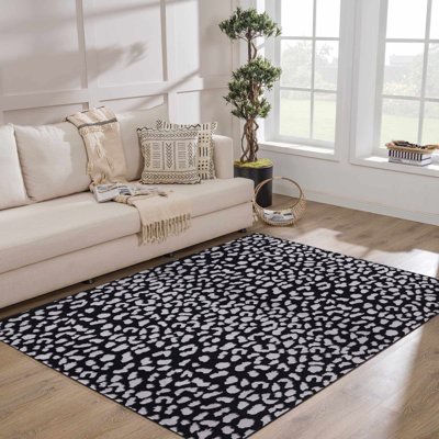Tapis noir et gris à motif animalier de la collection Amberella
