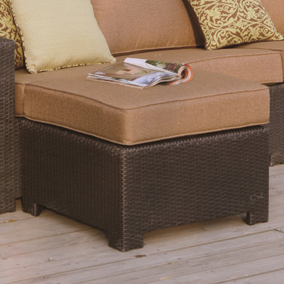 Leonore Wicker Outdoor Ottoman with Sunbrella® Cushion