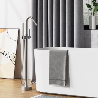 Floor Mounted Bathtub Faucet Freestanding Tub Filler with Handheld Shower, Single Handle Round Pipe Style, Anti Tangle Shower Hose, Matte Black Bathroom Trim System, For Stand Alone Bathtubs