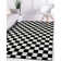 Tapis noir à motif géométrique Carpenter
