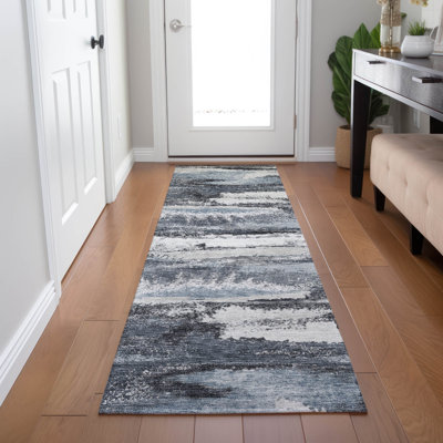 Tapis rectangulaire Aleighna avec envers antidérapant