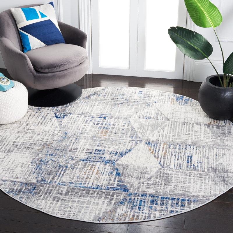 Tapis abstrait ivoire / bleu, Rond 6 pi 7 po