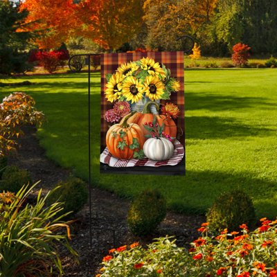 Drapeau d'automne avec arrangement de jardin