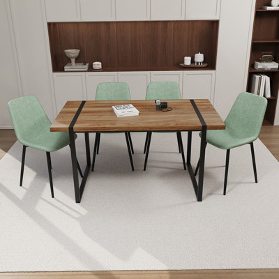 Ensemble de table et chaises de salle à manger moderne avec base rectangulaire en métal, idéal pour les réunions de famille et les expériences culinaires élégantes