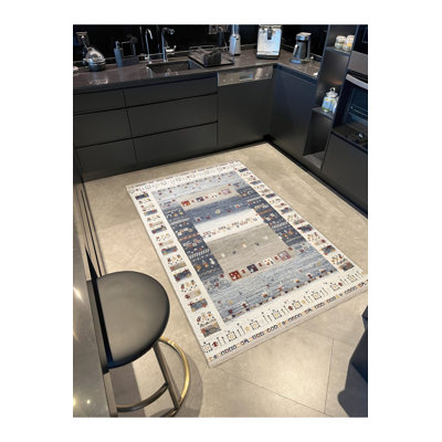 Tapis décoratif moderne bleu à motif mixte lavable à la machine