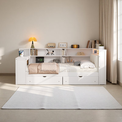 Lit plateforme en bois pleine grandeur avec tablettes de rangement, tiroirs, station de charge, DEL, bureau et tête de lit tapissier