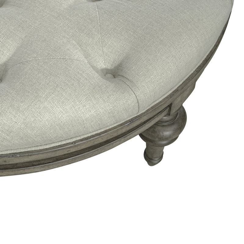 Arbrielle Tufted Round Linen Cocktail Ottoman with Wood Trim