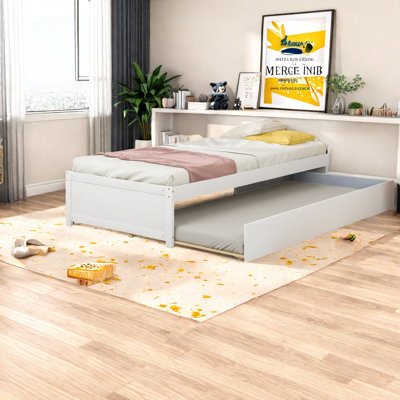 Lit simple moderne gigogne compact en bois massif pour petites maisons