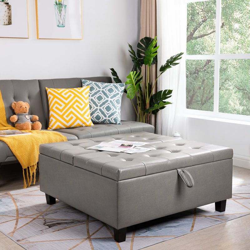 Grande table basse avec repose-pieds capitonné et capitonné avec rangement et dessus carré 35,43 po Ciara, Similicuir gris