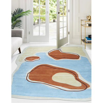 Tapis transitionnel bleu en laine touffeté à la main Joelly