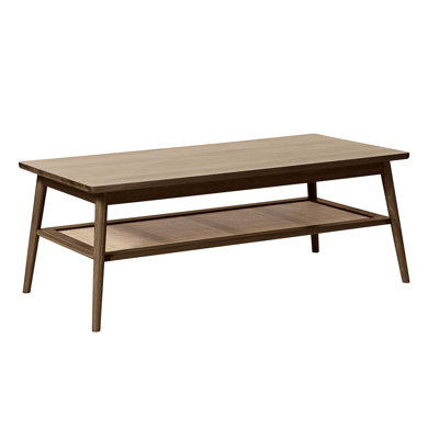 Table basse moderne avec panneau en rotin et pieds en angle massif