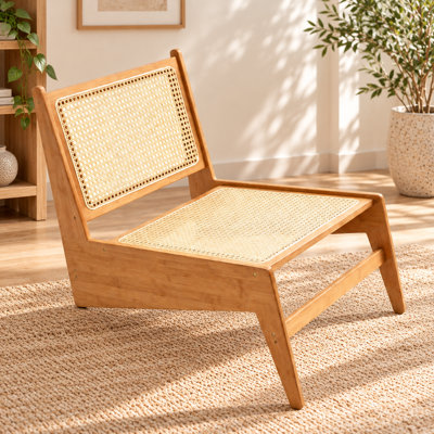 Fauteuil lounge d'appoint moderne en rotin tressé, sans accoudoirs, au design bas et sans accoudoirs, idéal pour le salon, le balcon ou la véranda.