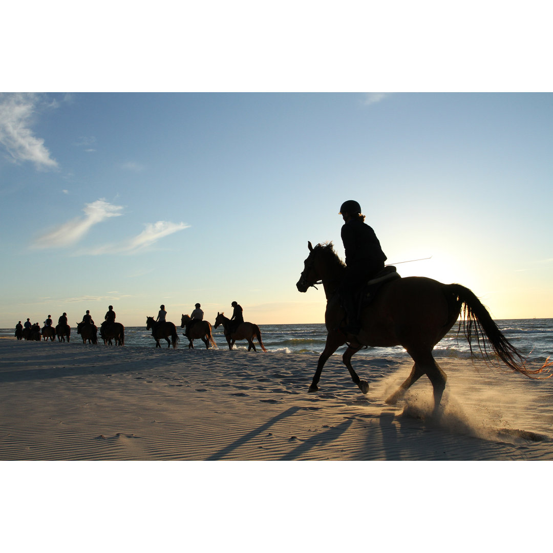 Leinwandbild Horse Riding on Beach