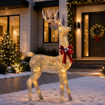 Renne lumineuse de 183 cm (72 pouces) couleur champagne pailleté, avec bois et nœud rouge, lumières DEL blanc chaud